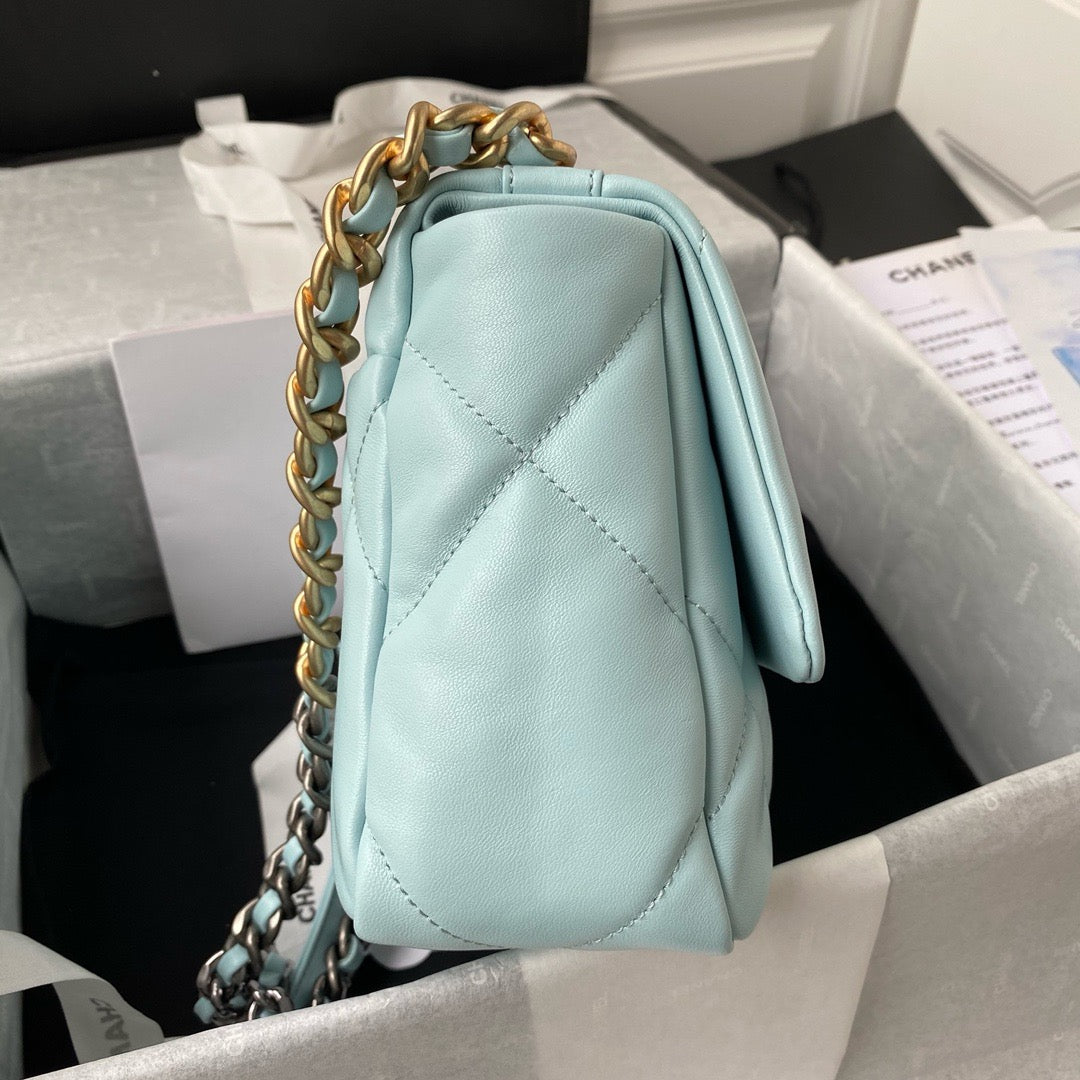 Side of chanel 19 handbag in lamb skin aqua colour