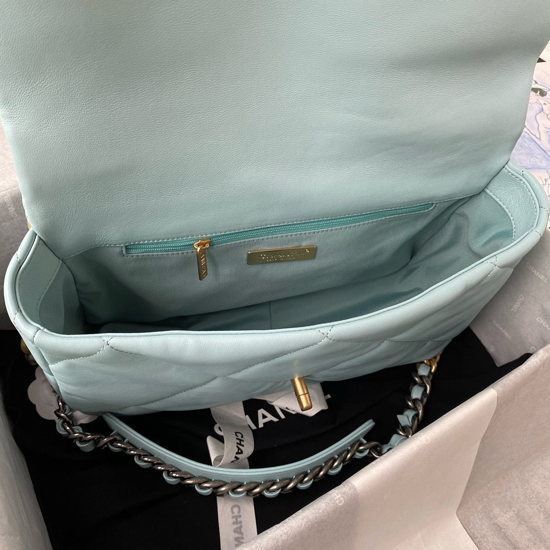 Inside of chanel 19 handbag in aqua colour lamb skin