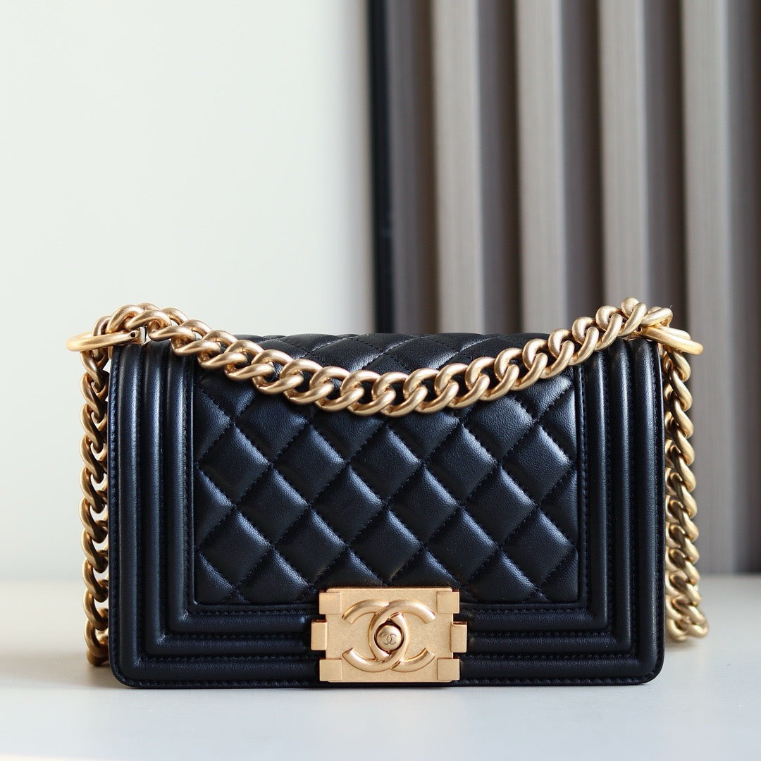 front of small black boy chanel handbag calf skin