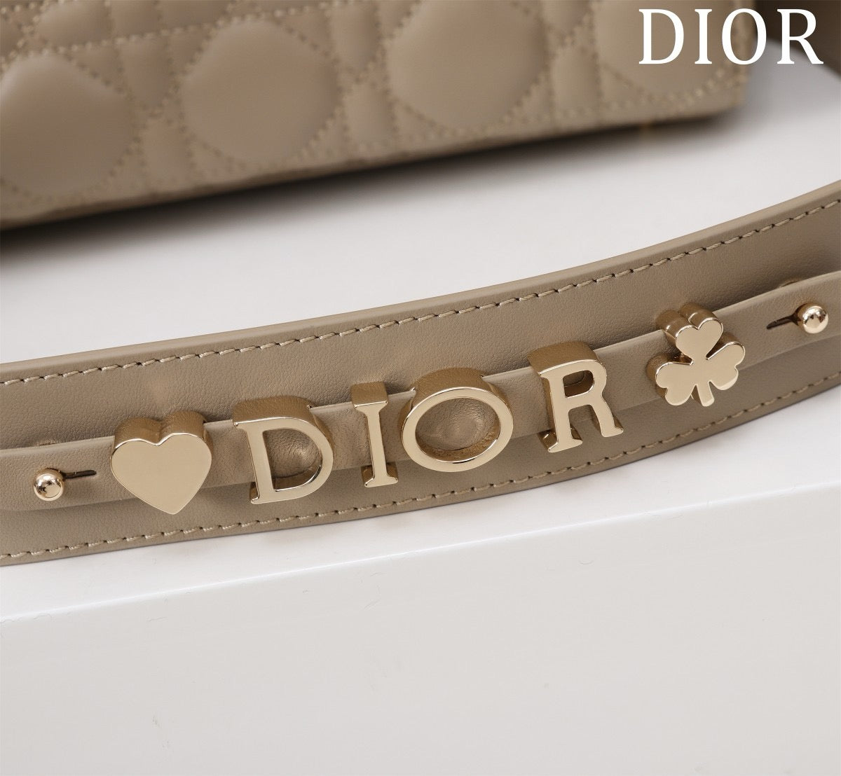 light gold hardware of lady dior bag