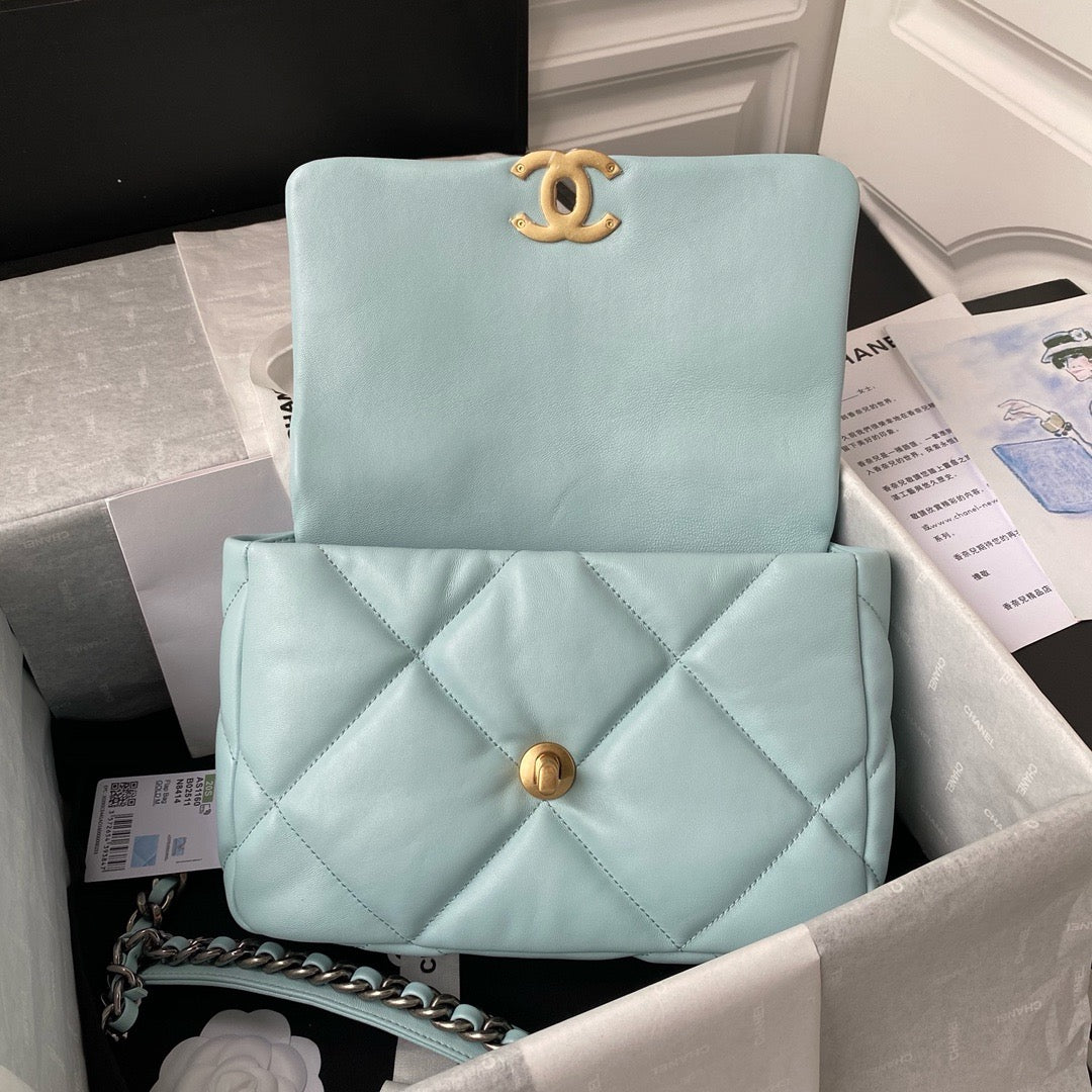 Opening of chanel 19 handbag flap aqua colour lamb skin