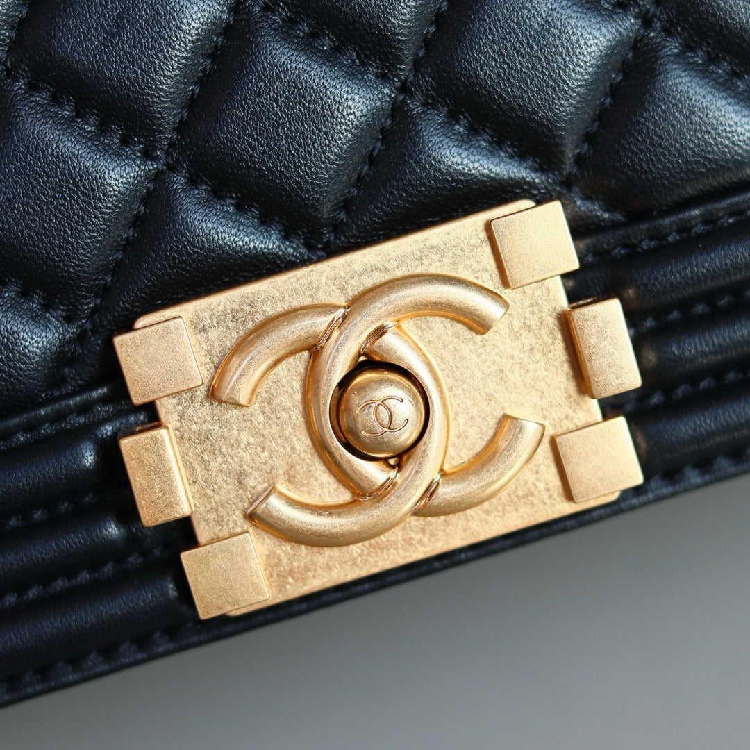 Chanel logo gold hardware on boy chanel bag