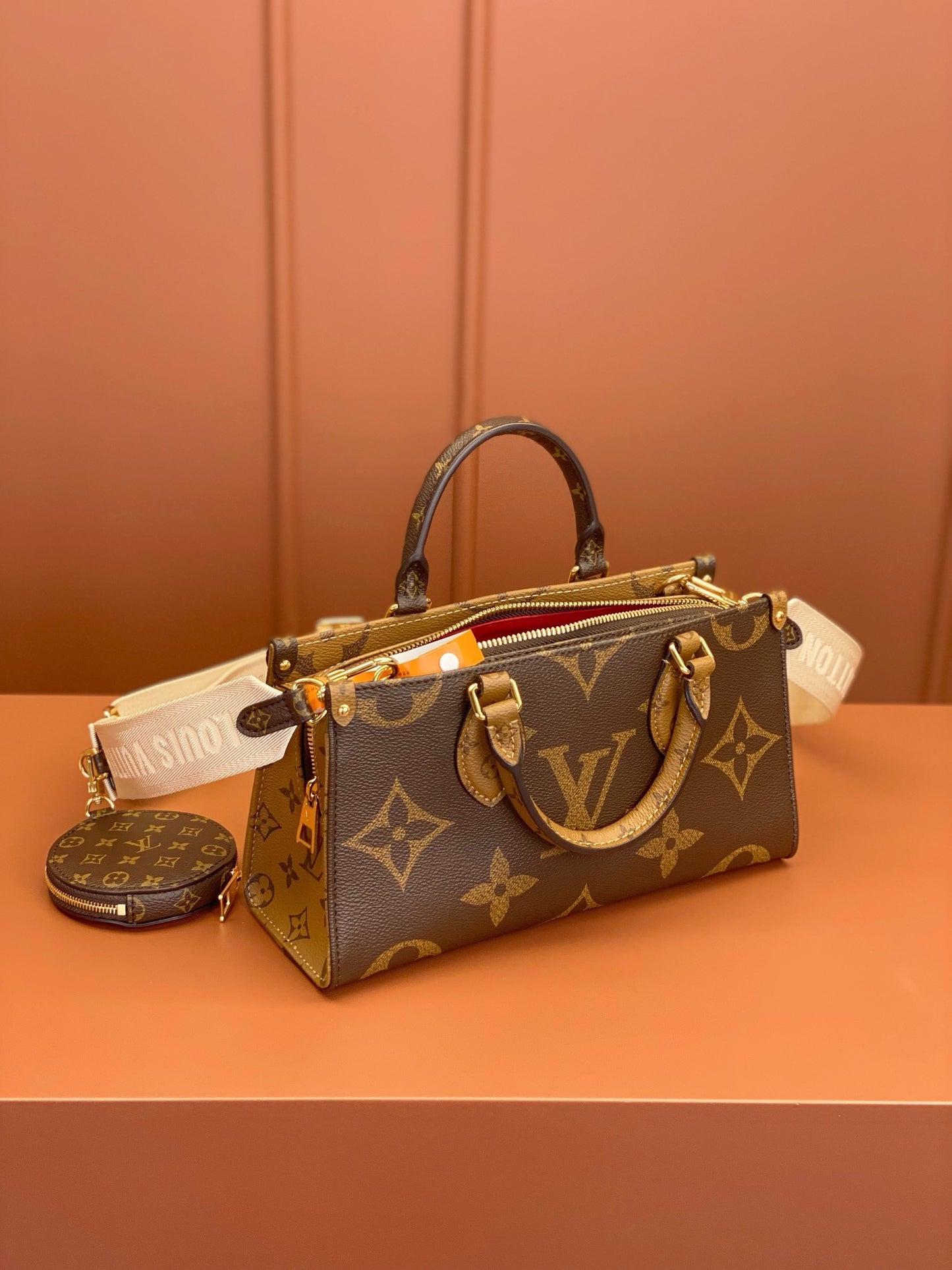 Louis Vuitton OnTheGo East West Platinum Grade