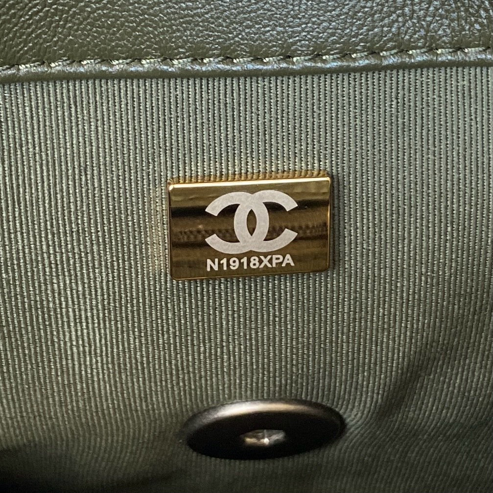 gold chanel logo inside khaki chanel 19 handbag lamb skin silver hardware