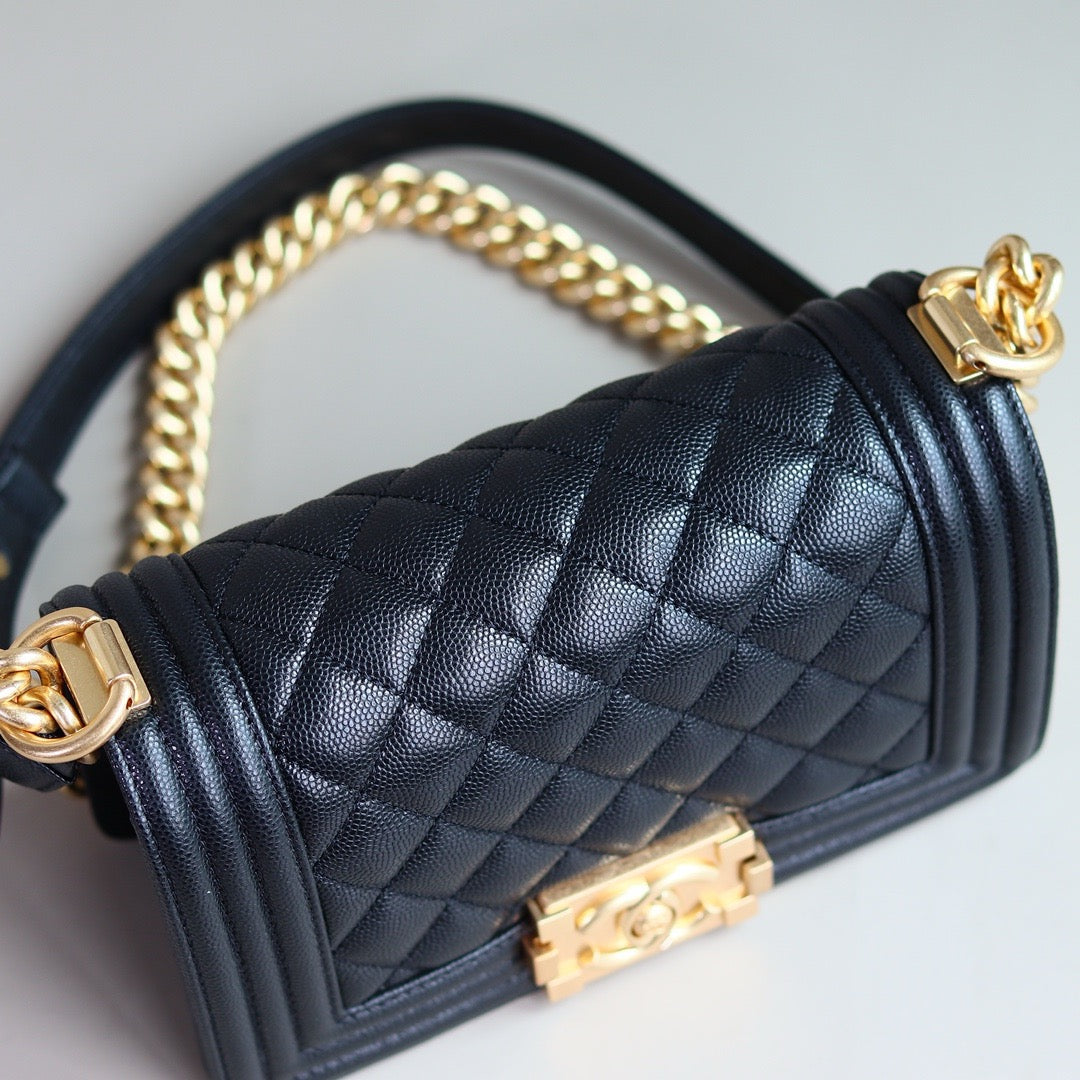 Top of black boy chanel handbag calf skin