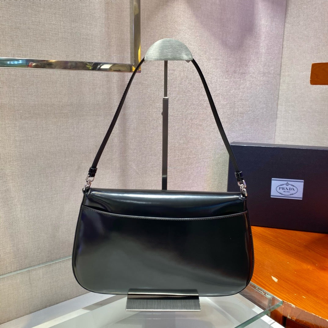 back side of black prada cleo brushed leather shoulder bag