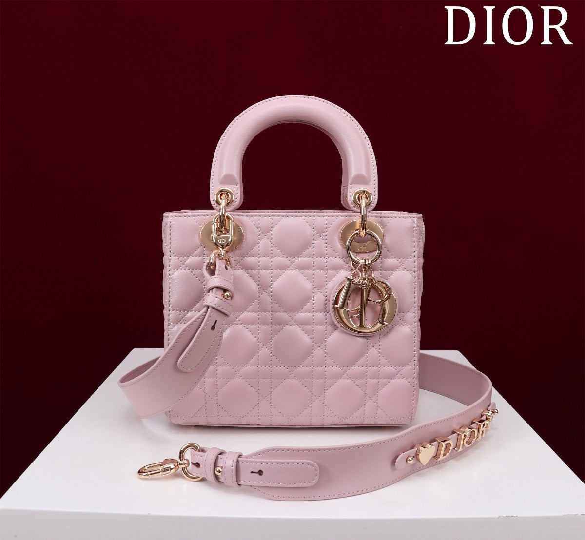 front of pink cannage lamb skin lady dior bag