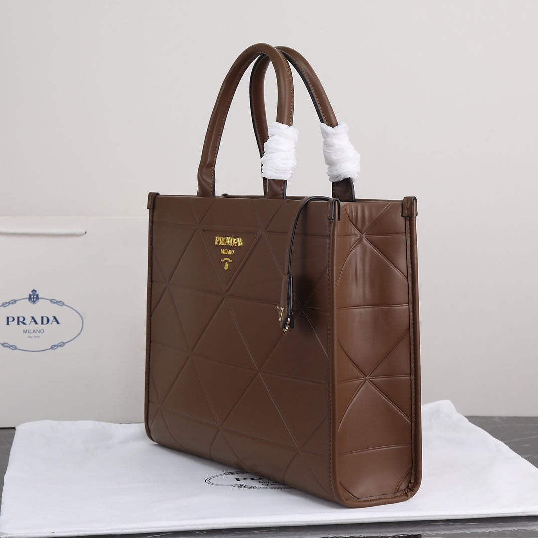 Brown Leather Prada Symbole bag with topstitching Grade 1