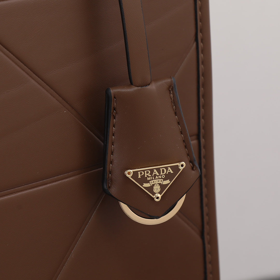 Brown Leather Prada Symbole bag with topstitching Grade 1