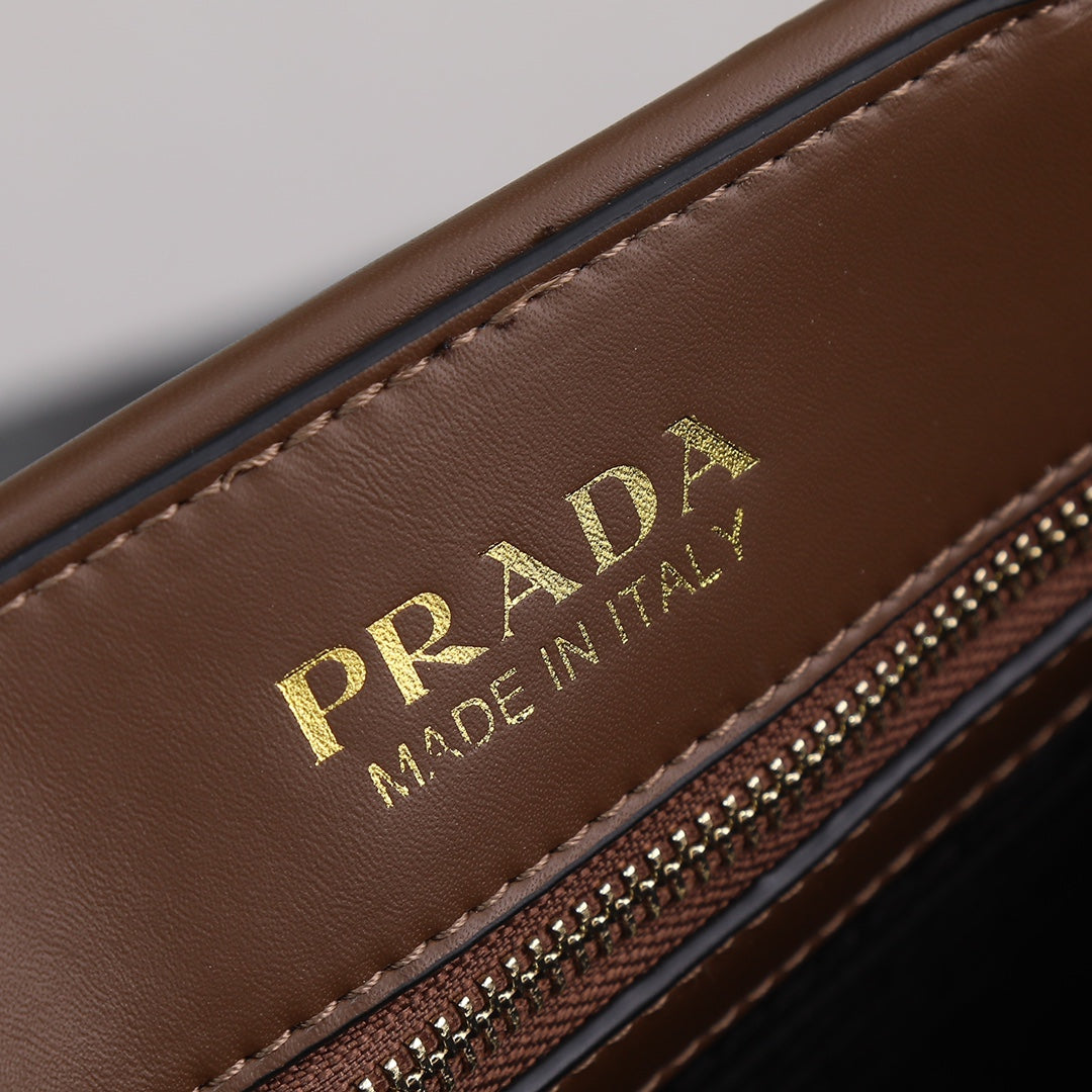 Brown Leather Prada Symbole bag with topstitching Grade 1